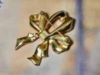 Bow pin Swarovski pave gold brooch