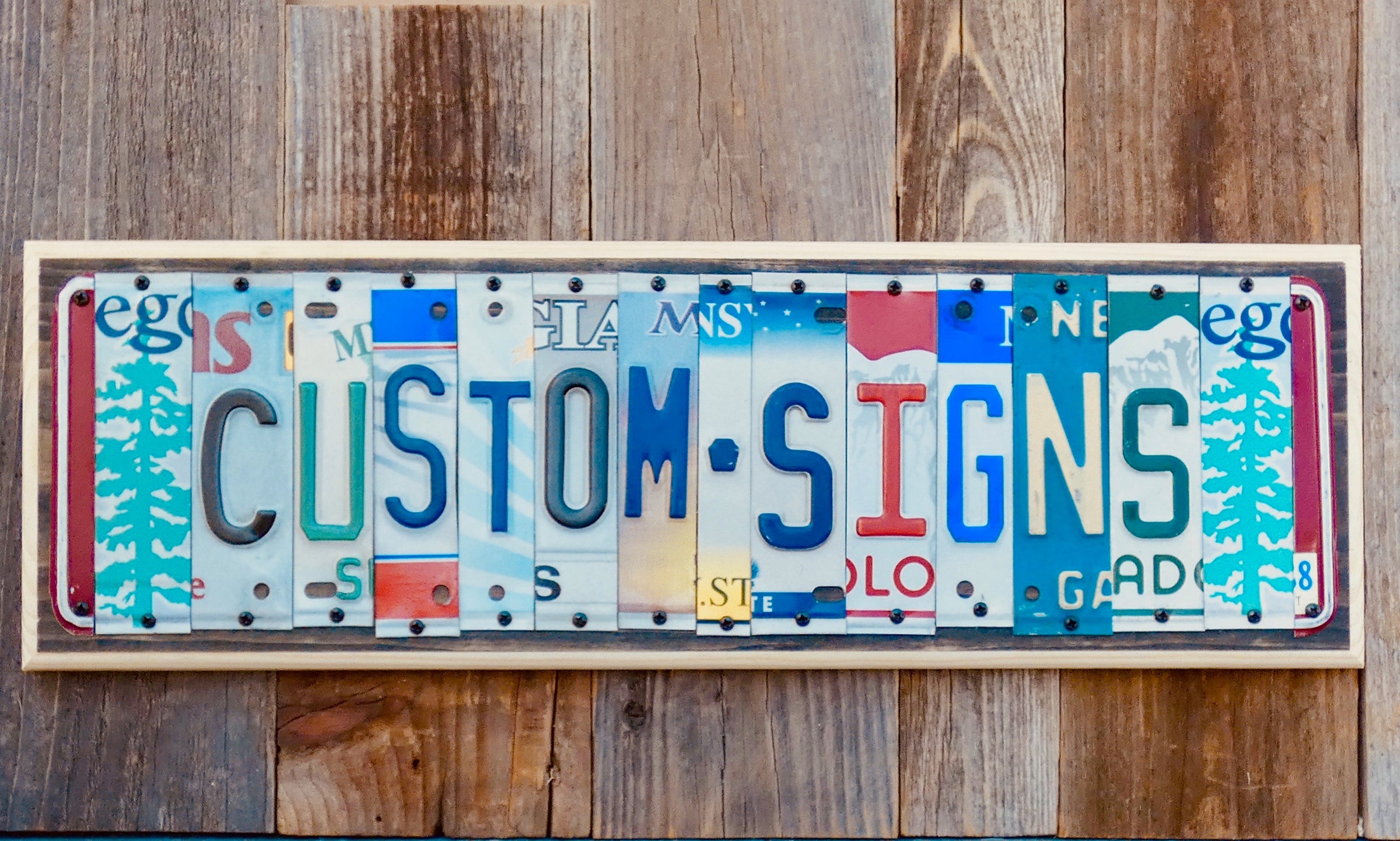 Custom Signs made with repurposed License plates