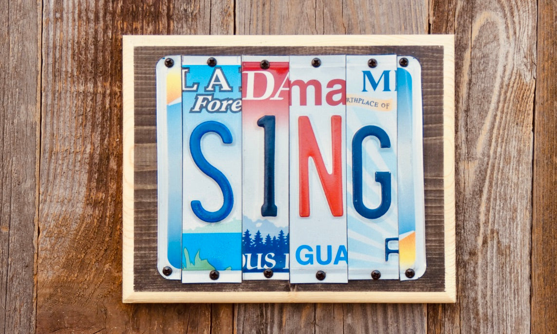 Sing License Plate Sign repurposed from colorful license plates