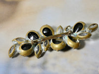 One of a Kind Vintage Black and Crystal Pin, prong set crystal stones