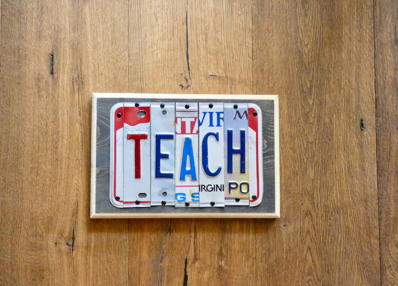TEACH Sign made with repurposed License Plates