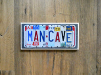 MAN CAVE Sign made with repurposed License Plates