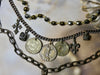 One of a kind triple strand charm necklace