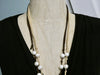 Pearl and Leather Necklace, suede tassel hand knotted long pendant, half pearl