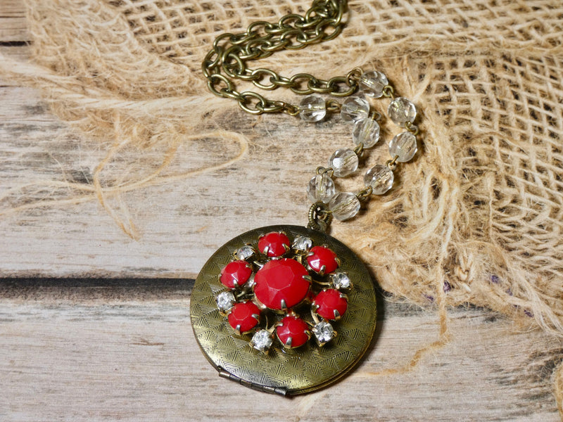 Brass round locket necklace embellished with red vintage earring