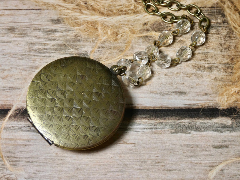 Brass round locket necklace embellished with red vintage earring