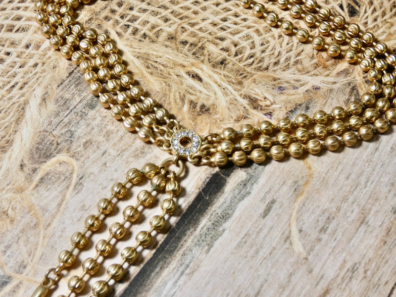 Matte gold triple strand necklace, costume statement necklace