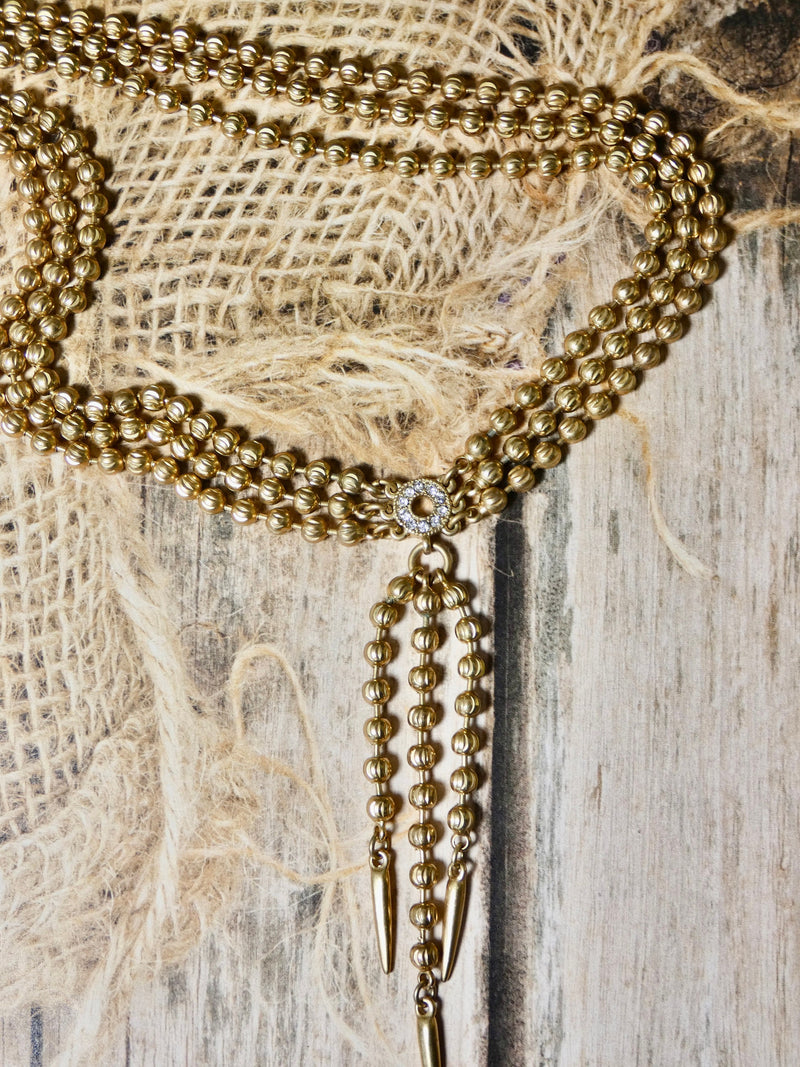 Matte gold triple strand necklace, costume statement necklace