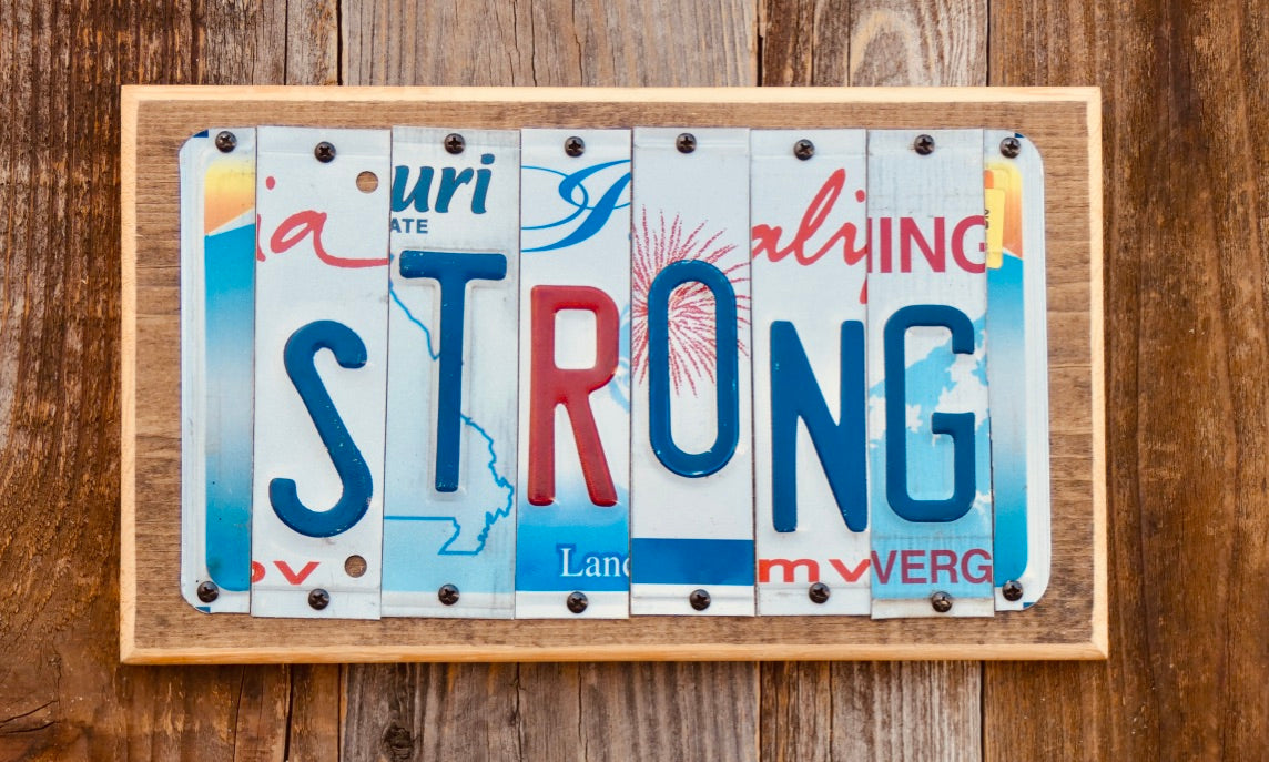 Strong License Plate Sign repurposed from license plates